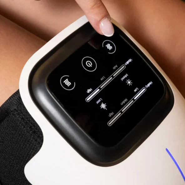 Red light knee massager control panel showing adjustable intensity and therapy settings