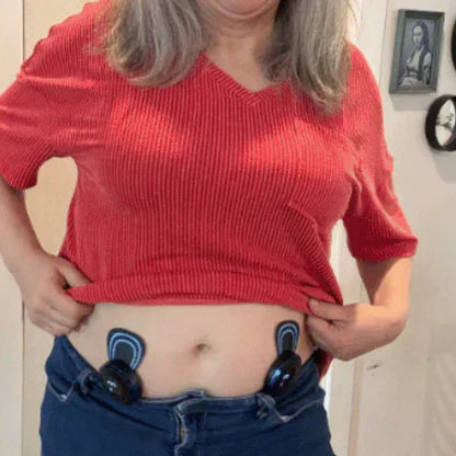 Woman using pelvic floor trainer pads for core and pelvic muscle activation at home